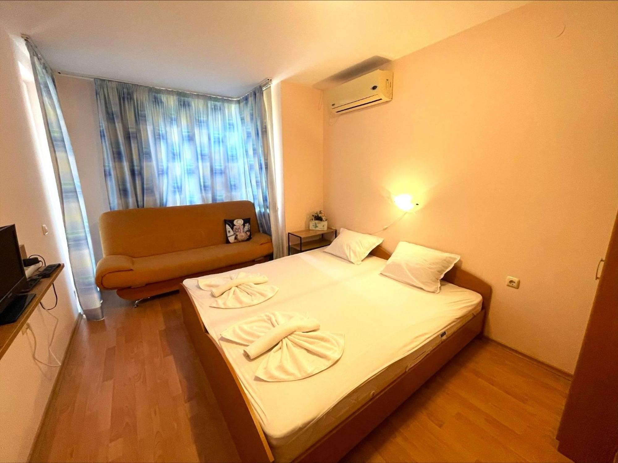 Holiday-Orchid Menada Apartments Napospart Szoba fotó